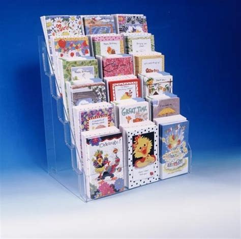 These attractive, inviting 12 or 24 pocket countertop greeting card racks put your cards in front of your. 301 Moved Permanently
