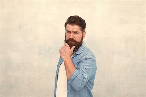 Making His Beard Perfect Brutal Hipster Male Serious Portrait