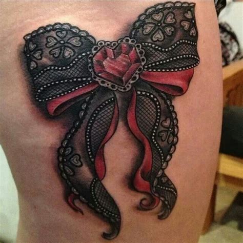 Black Lace Bow Tattoo On Arm