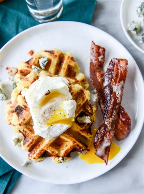 Crispy waffles made with potatoes? Bacon Blue Cheese Mashed Potato Waffles. | How Sweet It Is