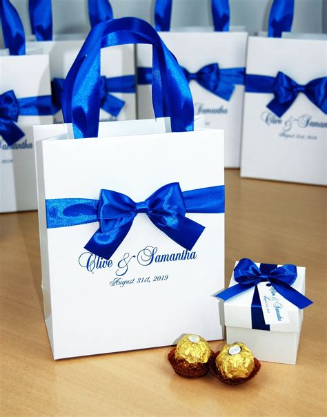 Harry and meghan got married at st george's chapel of windsor palace in london on may 19. Royal Blue Wedding Welcome Bags with satin ribbon, bow and ...