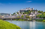 Salzburg skyline with Festung Hohensalzburg and Salzach river in summer ...