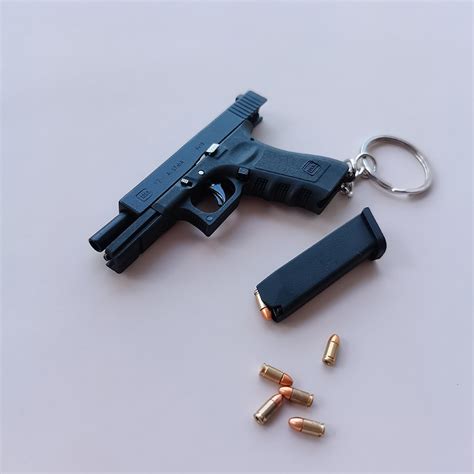 LLavero de Metal de alta calidad modelo de pistola en miniatura de aleación Empire Glock