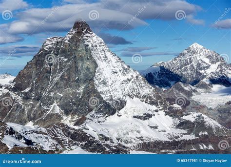 Winter Panorama Of Mount Matterhorn Covered With Clouds Canton Of