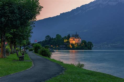 Iseltwald Peninsula And Former Castle In Switzerland Photograph By