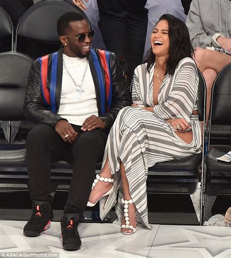 Diddy Cuddles Cassie As She Flashes Thigh At La Nba Game Daily Mail