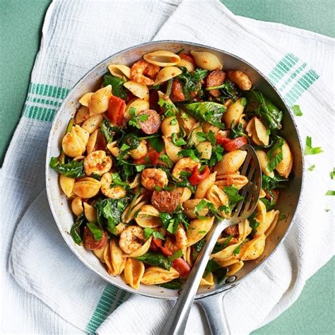 This chicken and chorizo pasta recipe is flavorful, simple, and comes together fast! Prawn and chorizo pasta - midweek meals - Good Housekeeping
