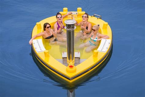 That Calls For A Party Hot Jug A Motorized Floating Wood Fired Hot Tub Luxurylaunches