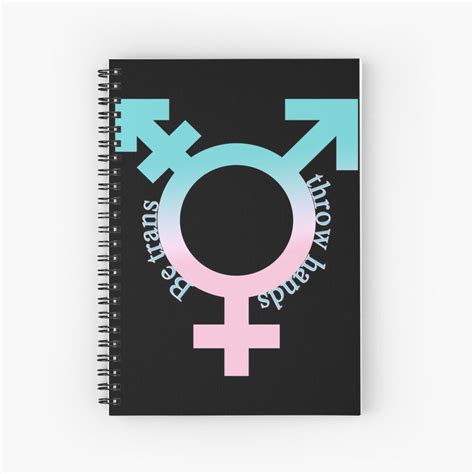 A Spiral Notebook With The Word Womens Rights Written In Pink And Blue On It