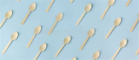 Wooden Spoons Top View Of Wooden Spoons Isolated On Blue Background