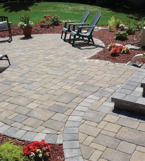 A Cobblestone Patio Stone Patio Designs Patio Stones Cobblestone