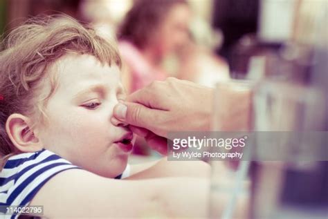 Pinching Her Nose Photo Getty Images