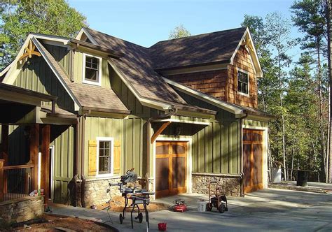 The garage can vary from one bay to three or more bays. 3 Car Rustic Garage with Living Above | Carriage house plans, Architectural design house plans ...