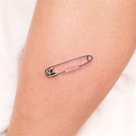 Micro Realistic Safety Pin Tattoo On The Inner Forearm