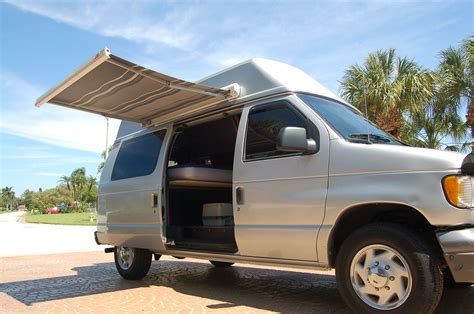 Camper vans or just campers allow their owners to make automobile trips for different distances, living in the vehicle itself. Ford Camper Van | The Fiamma awning opened up to block the ...