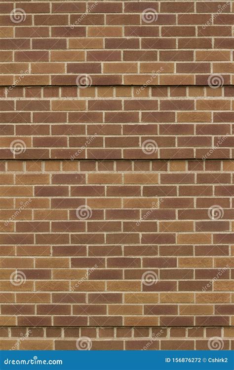 Unique Brown Color Brick Wall Texture With With Some Rows Of Protruding