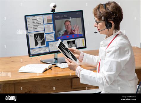 Symbolic Photo On Telemedicine A Doctor In A Doctors Office