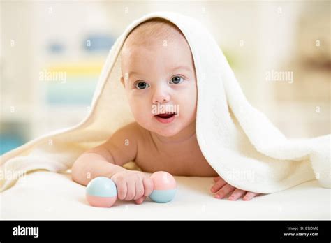 Baby Boy Under The Towel After Bathing At Home Stock Photo Alamy