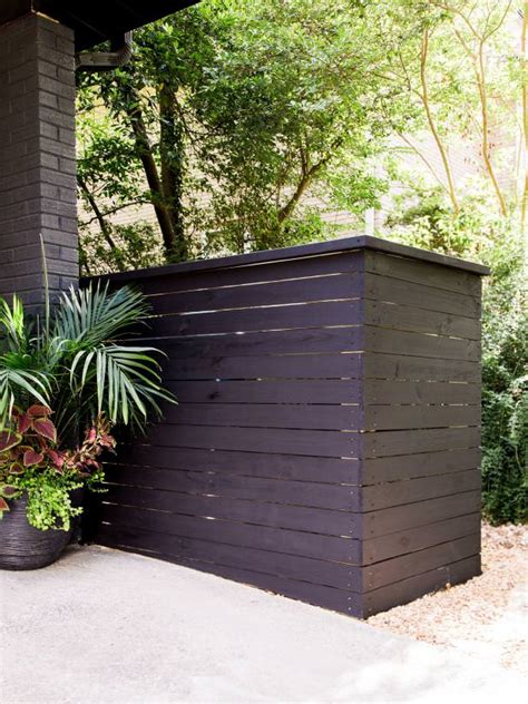 By april wilkerson on june 12, 2016. Trashy Looking Garbage Cans? Storage Ideas & Screen ...