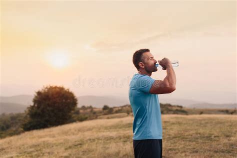Athletic Man Drinking Water Outdoor Stock Image Image Of Sunshine