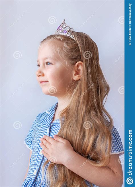 Beautiful Little Princess Girl In Silver Crown Holding Magic Wand