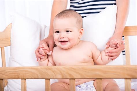 Premium Photo Portrait Of A Little Baby Boy In The Cradle At Home