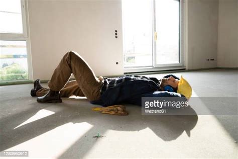 Construction Worker Sleeping Photos And Premium High Res Pictures