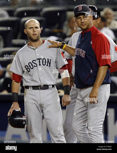 Boston Red Sox Manager Terry Francona Puts His Hand On The Shoulder Of