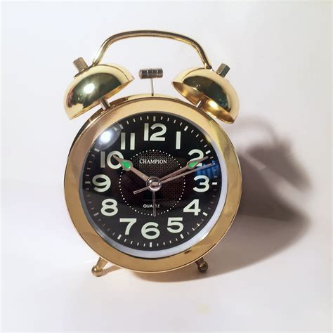 Gold Metal Traditional Alarm Clock Made By Champion Battery Quartz