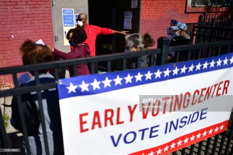 Long Lines Of Voters Wait To Cast Early Voting Ballots At The A B