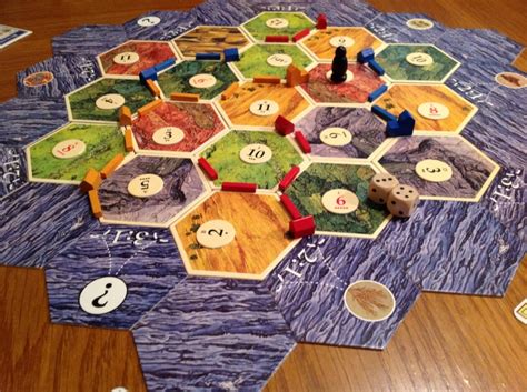 It is a member of the catan series of games developed by klaus teuber and published by kosmos in german, and by mayfair games in english. The Settlers of Catan Review | Board Game Quest