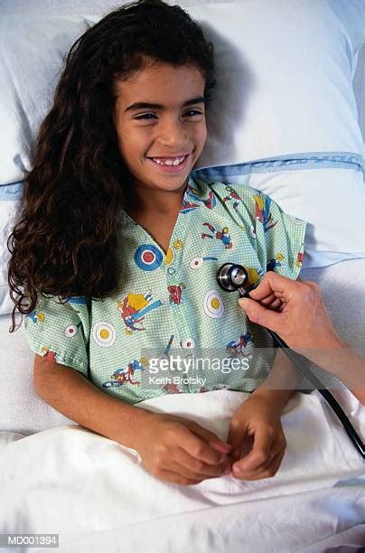 girl 6 7 using stethoscope to listen doctor photos and premium high res pictures getty images