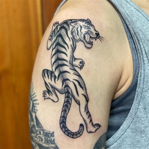 Tiger Tattoo Done On The Upper Arm