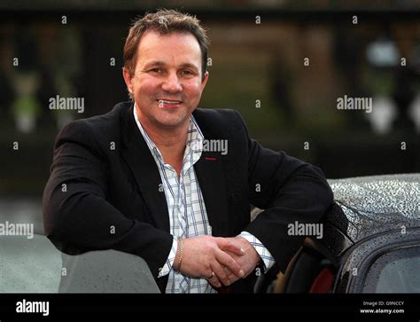 Brian Wiltshire stands by his car in Lancaster, after he successfully