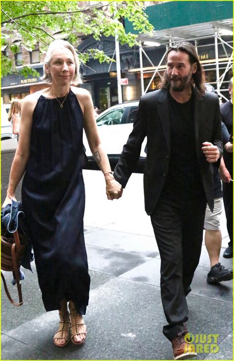 Keanu Reeves Holds Hands With Girlfriend Alexandra Grant At Airport