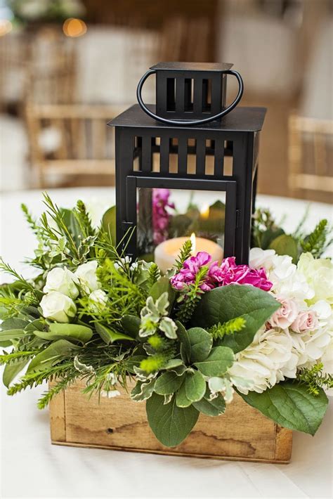 Black Lantern Centerpiece With Fresh Greenery Wedding Flower