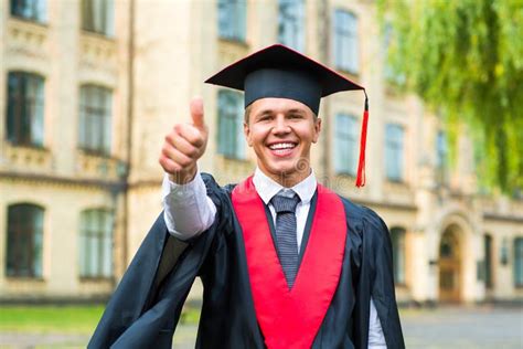 Portrait Of A Happy Graduate Male Student Graduation Concepts Stock