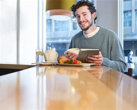 Young Man Having Breakfast Stock Image Image Of Male 57608053
