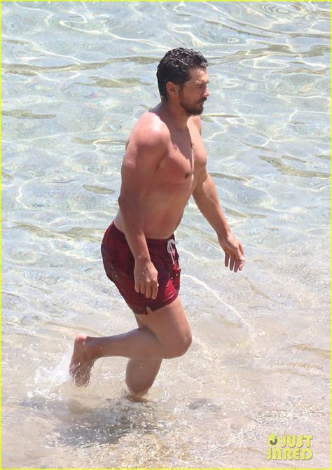 james franco spotted shirtless at the beach in greece with longtime girlfriend izabel pakzad