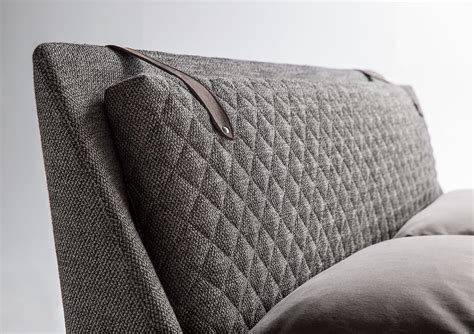 A Close Up View Of The Back Of A Couch