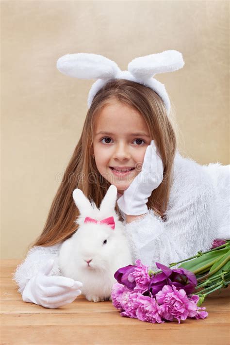 Cute Bunnies With Spring Flowers Stock Image Image 49924369