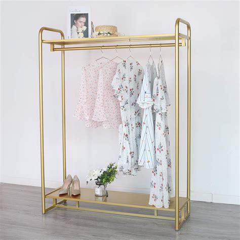 Homekayt Gold Clothing Rack Modern Boutique Display Rack With 2 Tier Shelf Full Metal Garment
