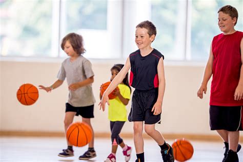 Children Dribbling A Basketball Stock Photo Download Image Now Istock