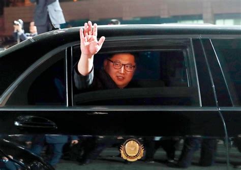 Kim Jong Uns Bodyguards Trot Beside His Limousine When He Travels