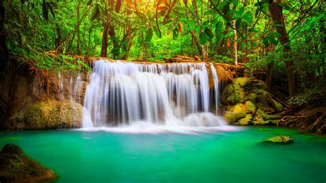 Wonderful Tropical Waterfall Blue Water Nature Forest With Green Trees