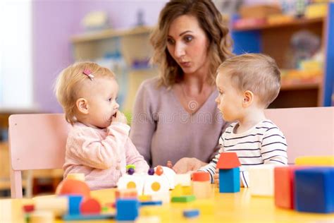 Children In Kindergarten Kids In Nursery School Little Girl And Boy