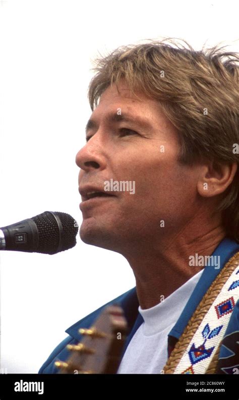 Singer John Denver Performs At An Earth Day Rally At The United States