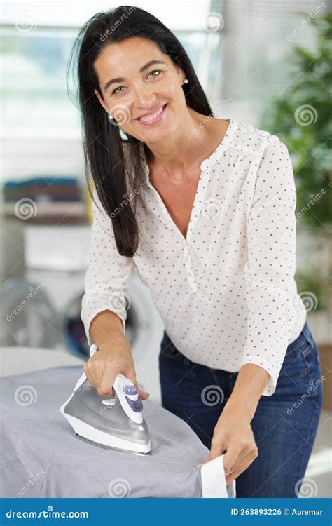 Mature Lady Ironing Clothes Stock Photo Image Of Businesswoman Board