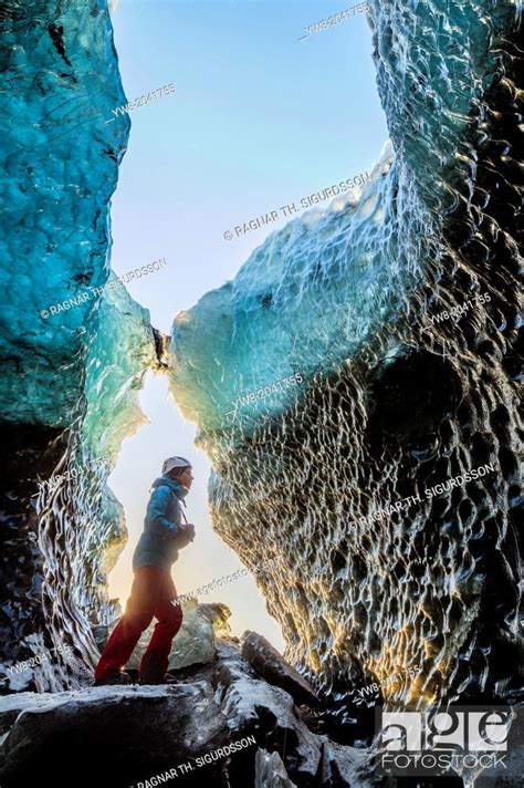 Exploring A Glacial Ice Cave Svinafellsjokull Iceland Stock Photo