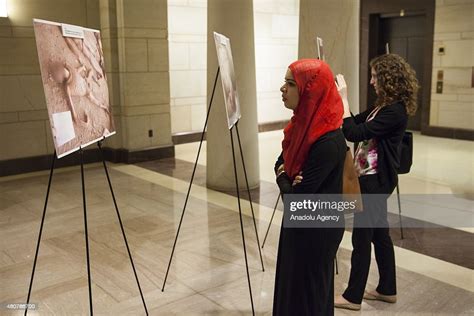 A Visitor Looks At Photographs In The Caesars Photos Inside News Photo Getty Images